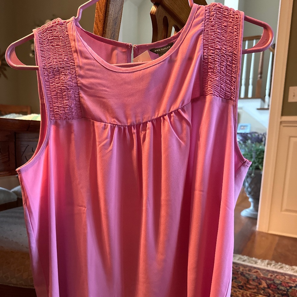 Pink sleeveless blouse